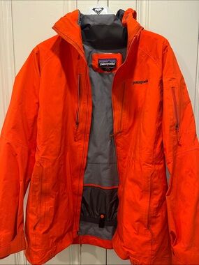 Patagonia Women’s Bright Orange Powslayer Ski and Ride Jacket